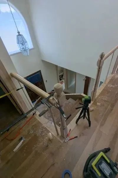 Installing wooden newel posts and handrails