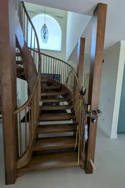 Nearly complete staircase with outer handrail