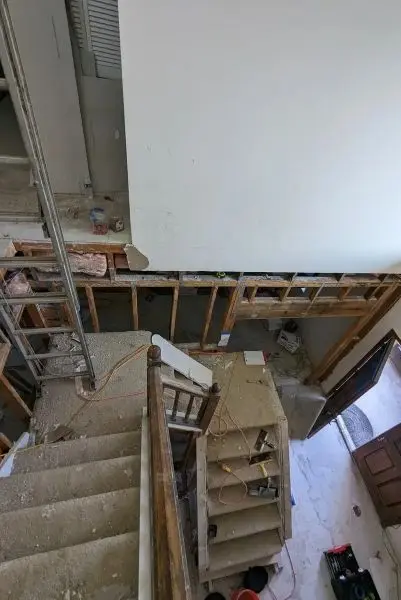 Original staircase during demolition