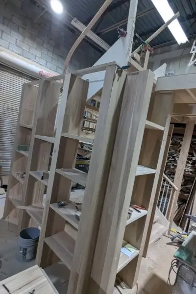 Unfinished hickory shelving in shop