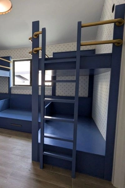 Blue bunks with brass railings