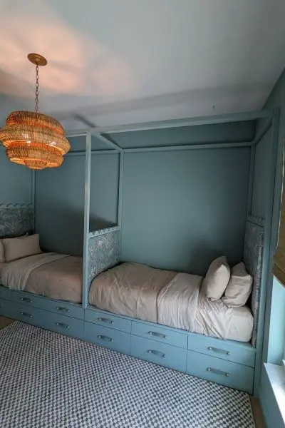 White bunks with Chippendale railings