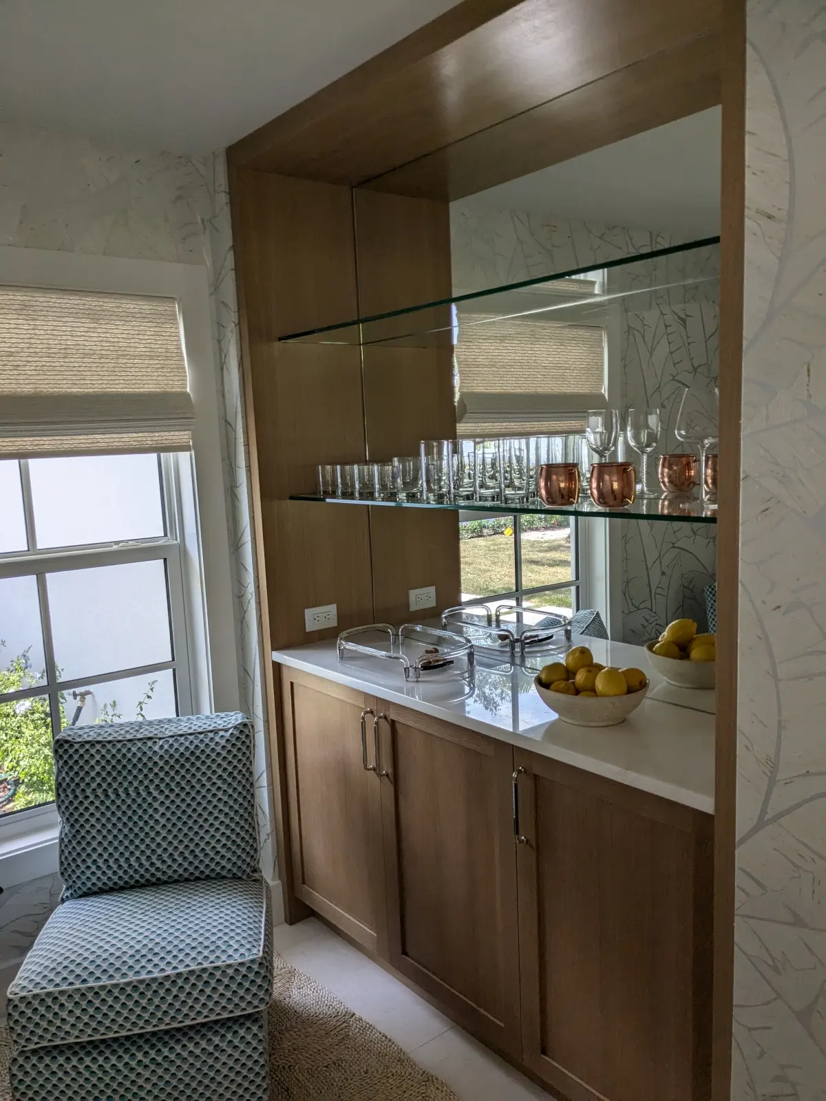 White-oak-dry-bar-with-mirrored-backsplash
