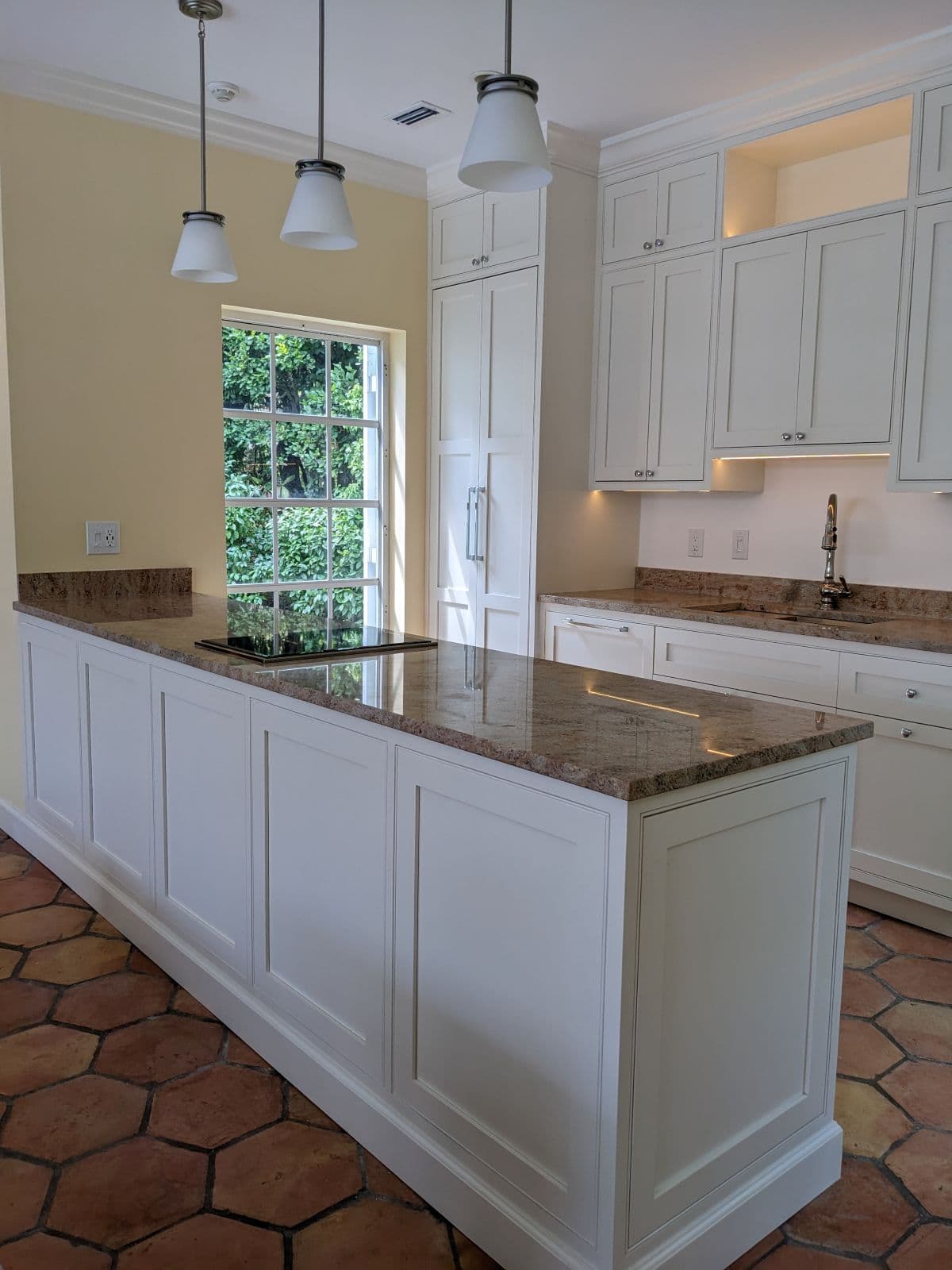 Poolhouse kitchen with inset cabinetry